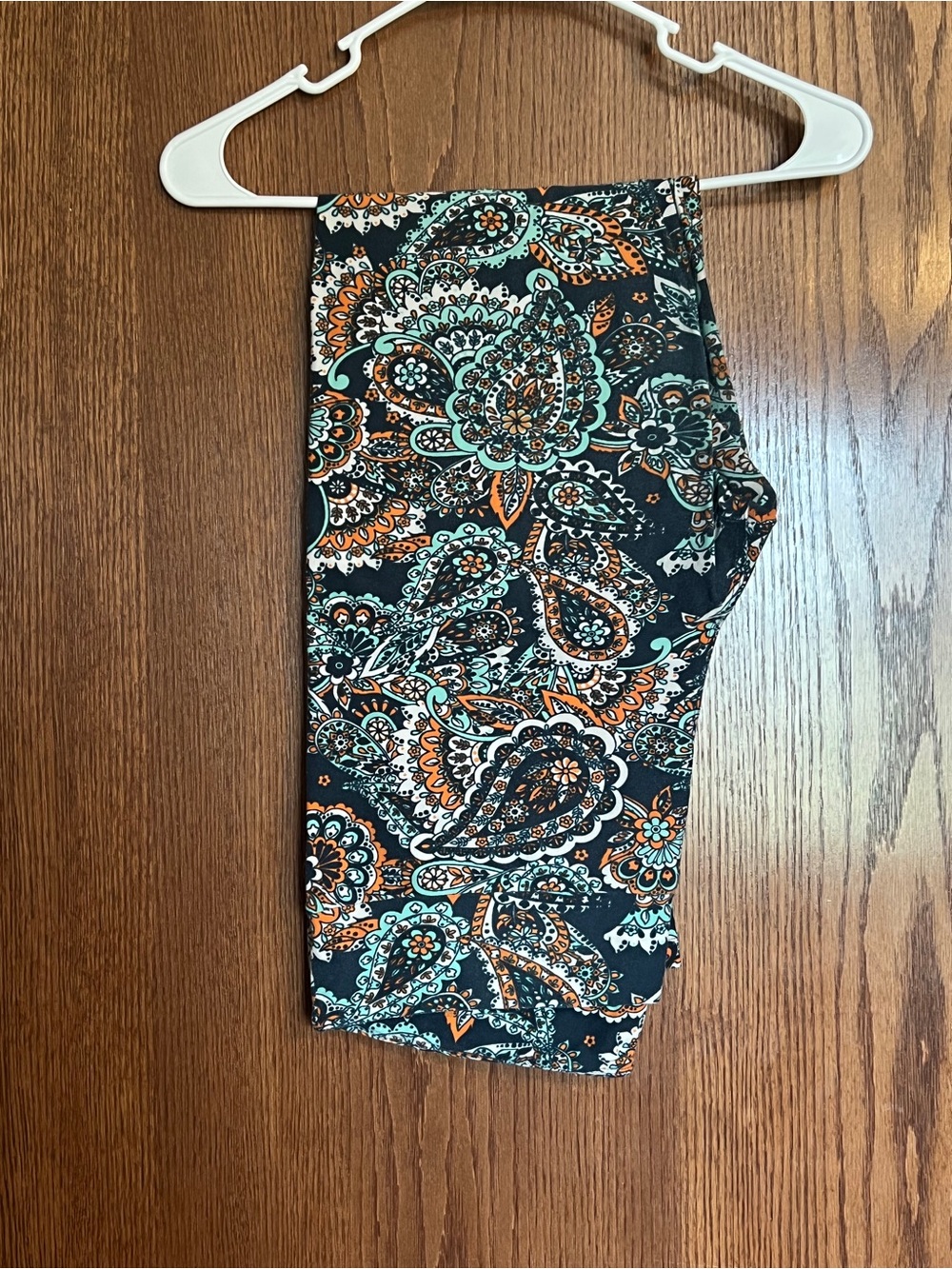 LuLaRoe Black Paisley Leggings with Teal and Orange Accents